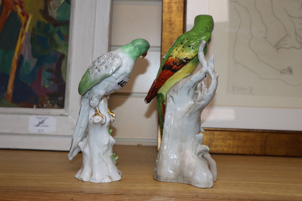 A Continental porcelain figure of a parrot and a German porcelain parrot, tallest